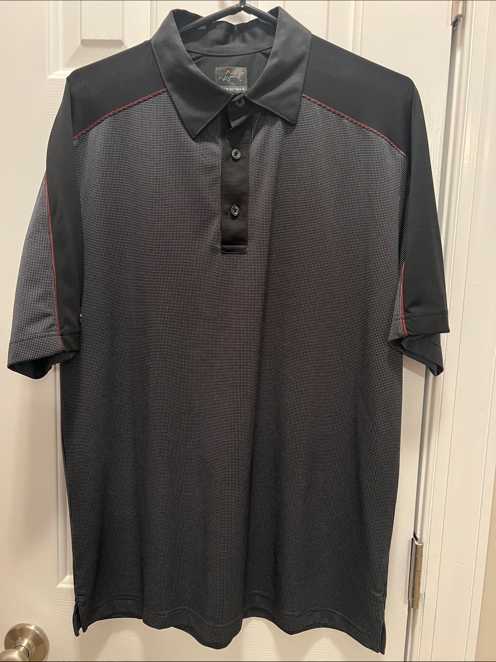 Greg Norman Collection Black Polo with Red Accent Stitching
